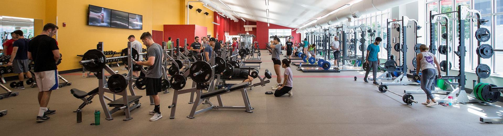 student athletes working out in a gym 